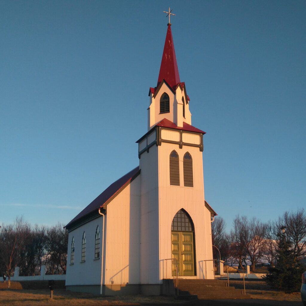 Hvanneyrarkirkja, the small timber church at Hvanneyri in West Iceland, beside which stand the Agricultural Museum of Iceland and the Ullarselið wool centre.