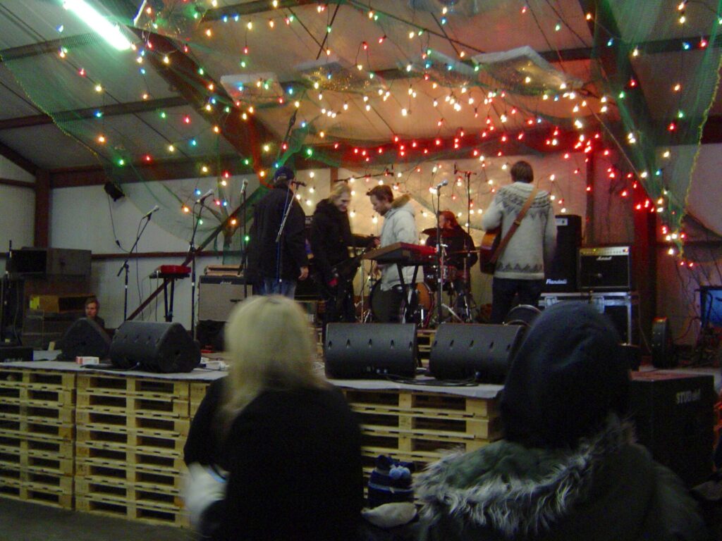 Crowd and performers at the Aldrei fór ég suður music festival in Ísafjörður, Iceland