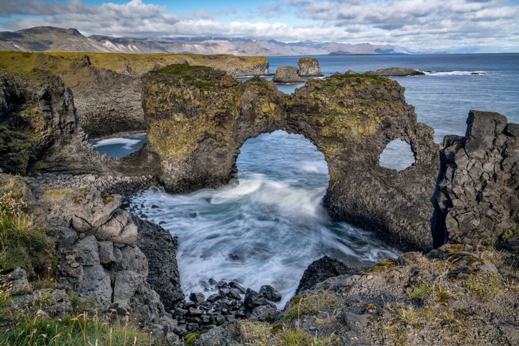 Gatklettur, a natural basalt sea arch on the coast near Arnarstapi on the Snæfellsnes peninsula, Iceland