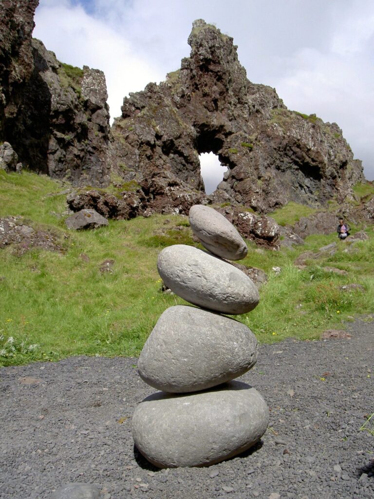 The four traditional lifting stones on the black pebble beach at Djúpalónssandur, Iceland