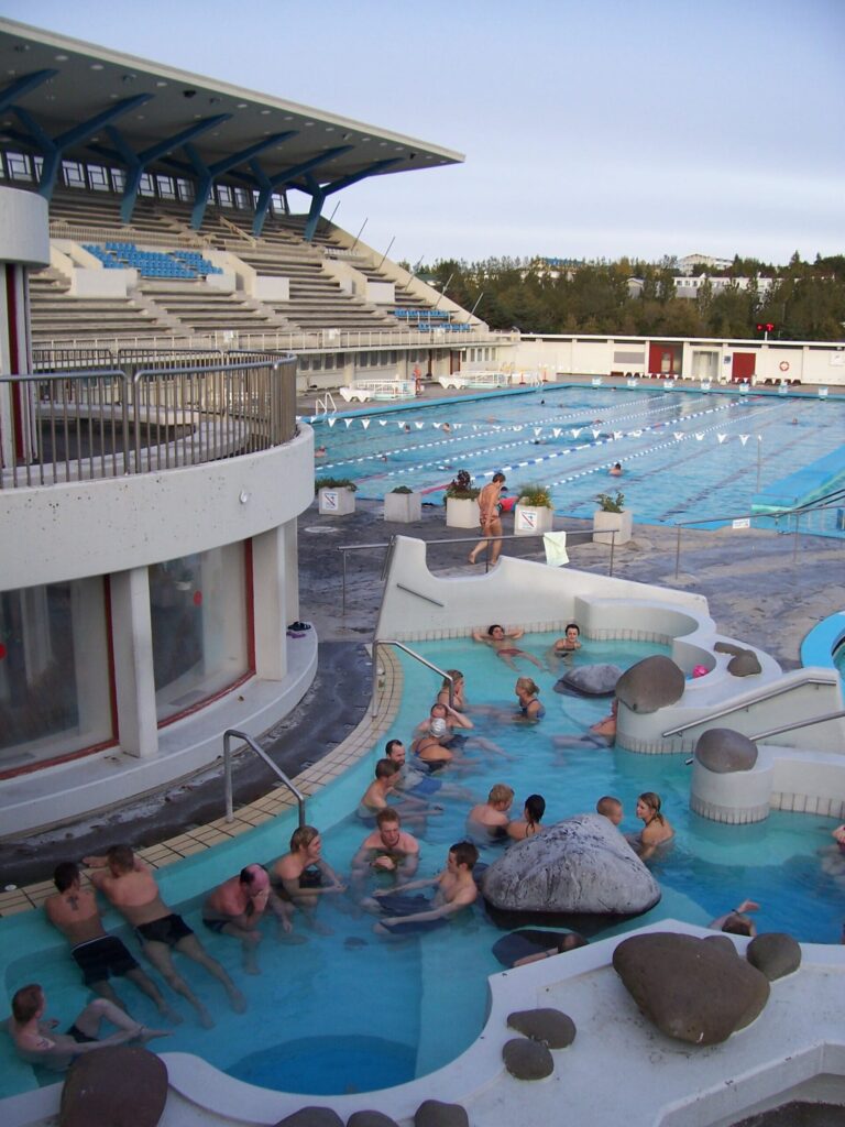 A geothermal outdoor swimming pool in Iceland, similar to small-town pools found across the country