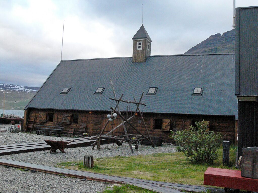 Turnhúsið, a black-painted 18th-century timber building in the Neðstikaupstaður old harbour district of Ísafjörður, Iceland