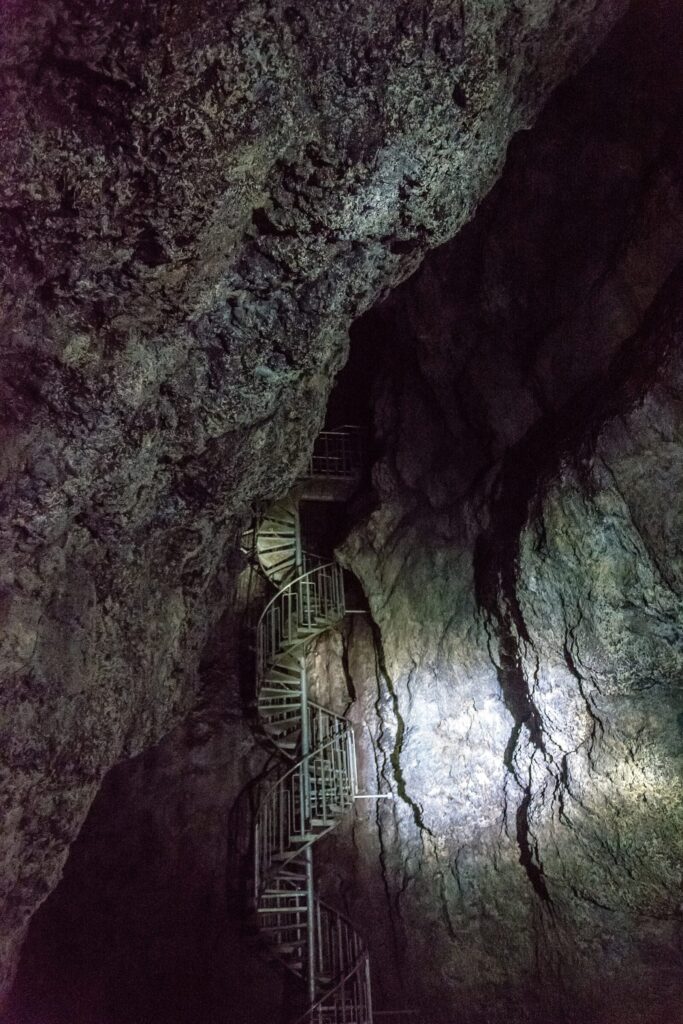 Interior of Vatnshellir lava cave on Snæfellsnes, Iceland, showing the rock walls of the underground lava tube